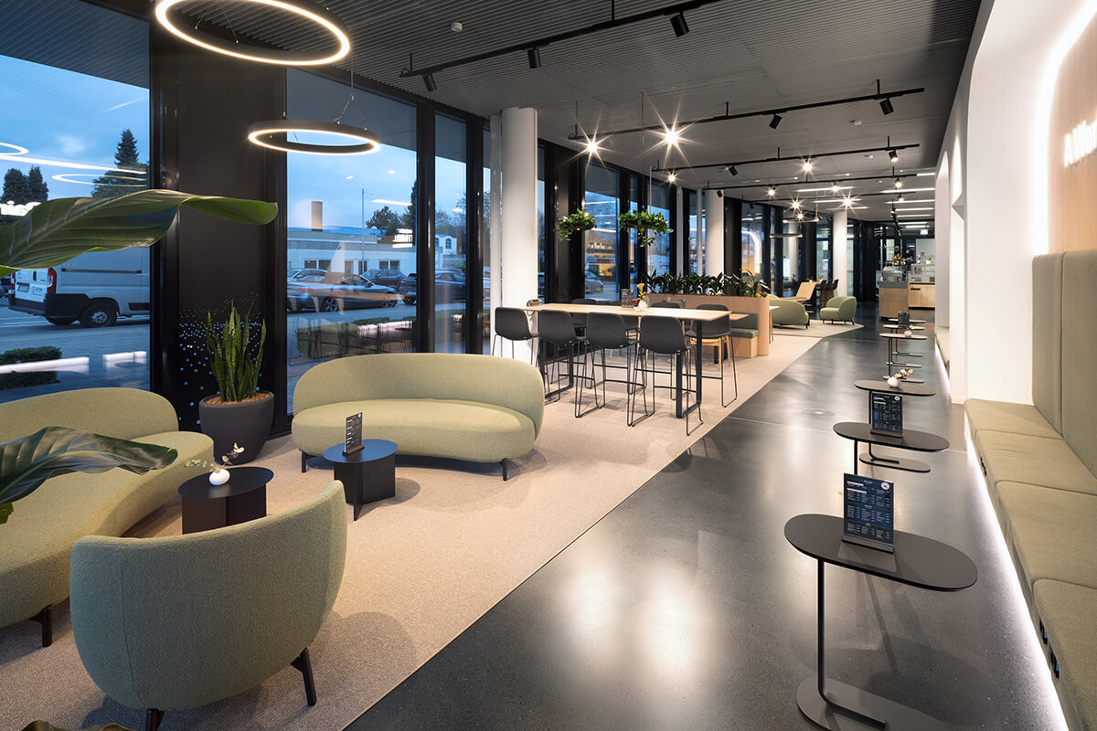 Inspiring office interior with co-working zones and social hub, realised by Display International as a full-service partner.