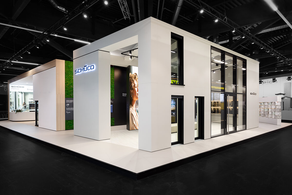 Modern exhibition stand for Schüco at Fensterbau Frontale Nuremberg – precise stand construction, clean architecture and strong brand staging.